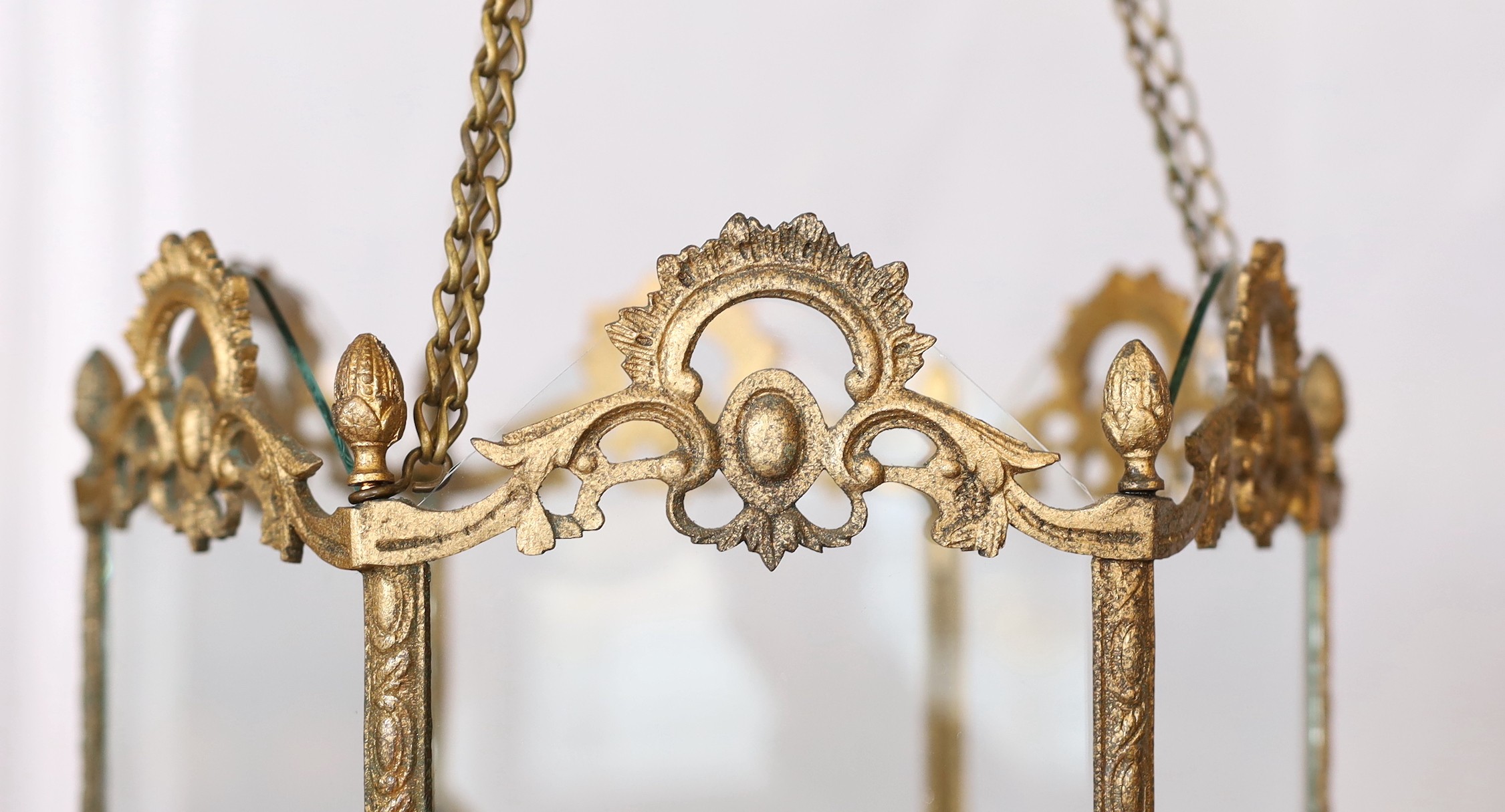 A mid 19th century English hexagonal brass hall lantern with scroll moulded frame, drop from rose 64cm. width 25cm